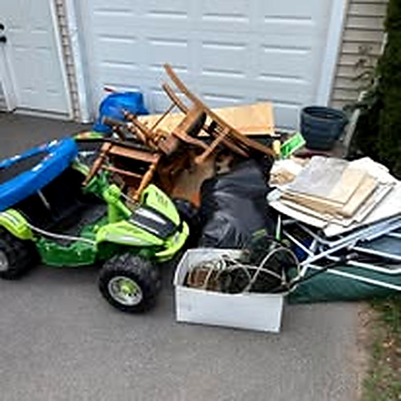 Miscellaneous household junk pile before removal