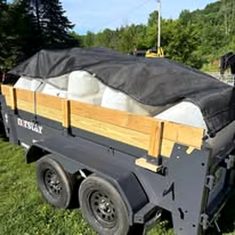 Loaded Trash Bandit trailer ready for haul-away
