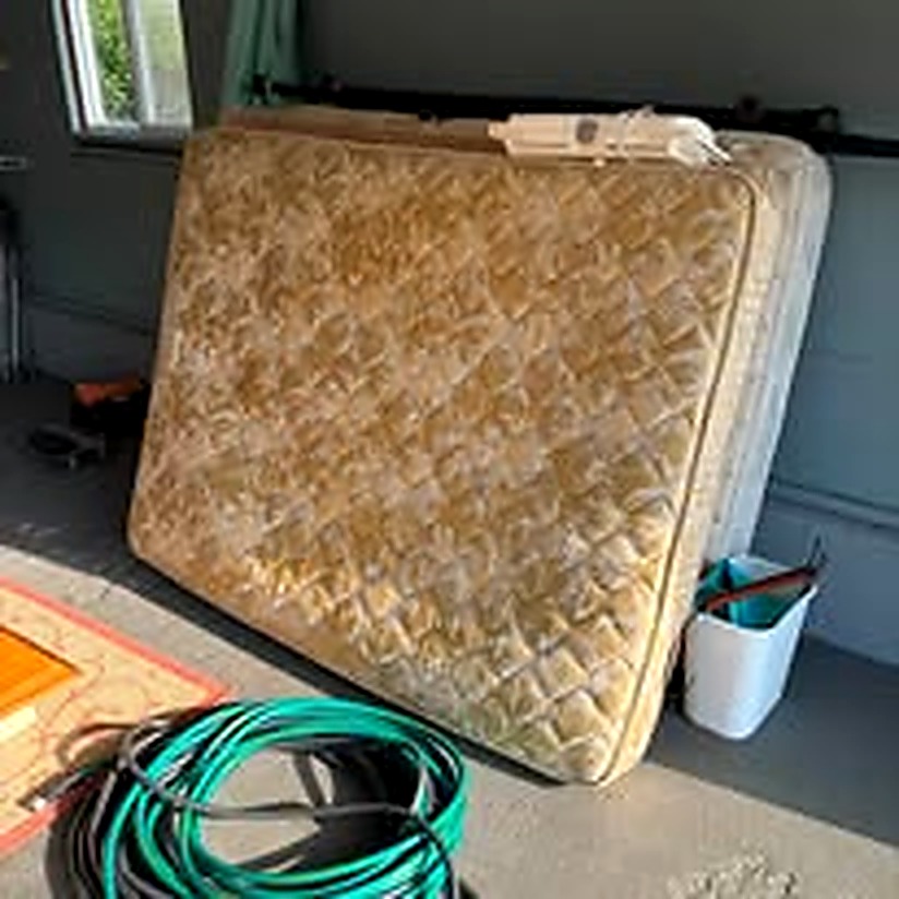 Mattress loaded for removal