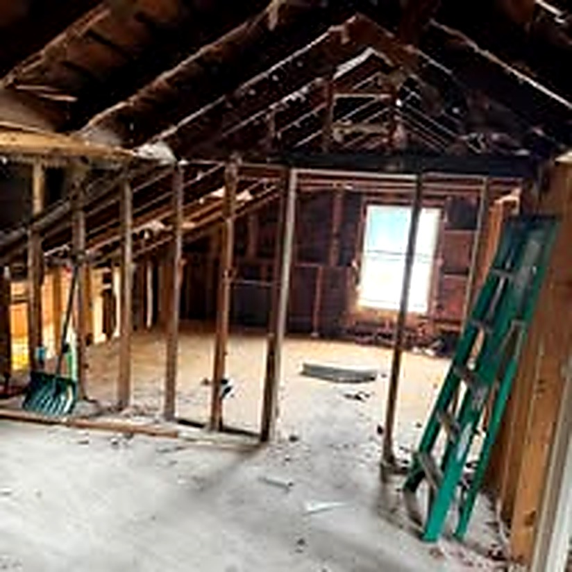 Attic construction debris during removal