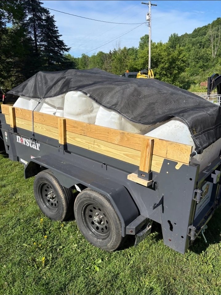 Trash Bandit Junk Removal trailer loaded and ready