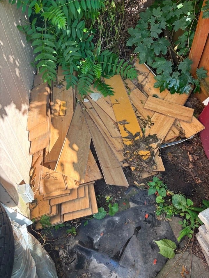 Wood and lumber debris pile before removal