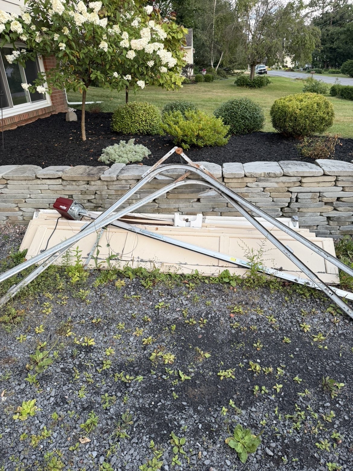 Clean landscaping after outdoor debris removal